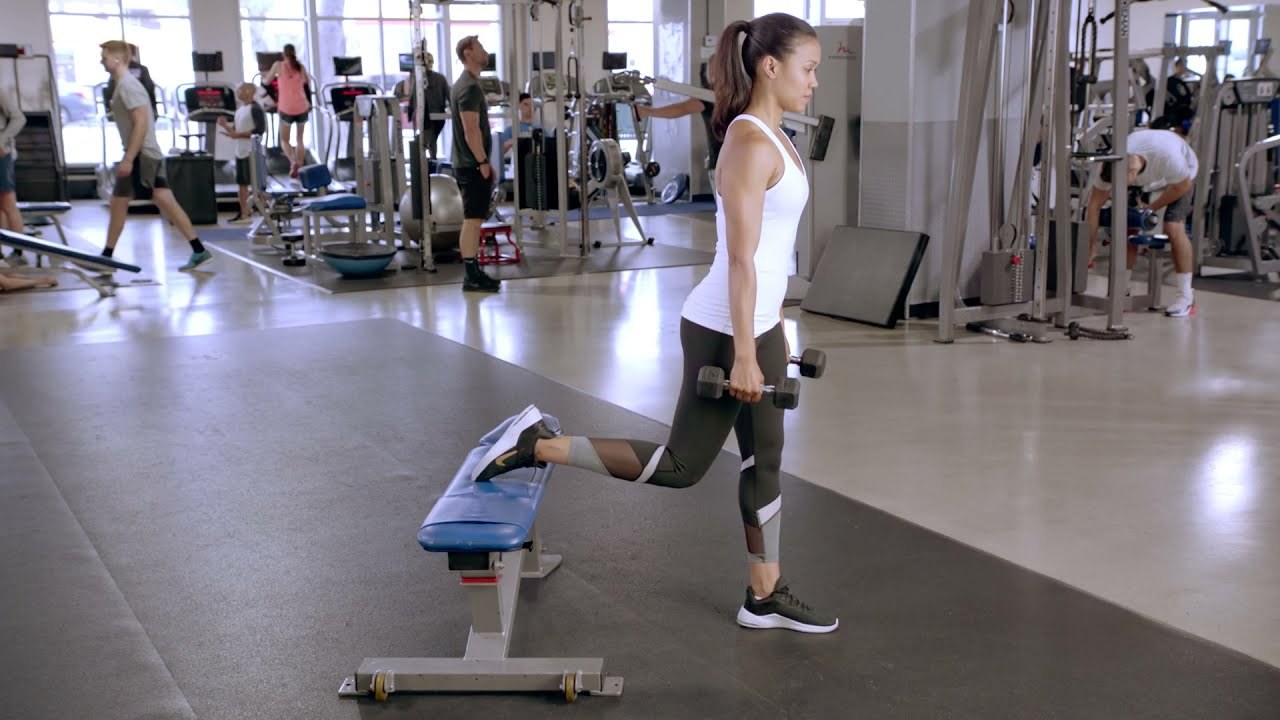 Bulgarian Split Squat demonstrated by a NASM presenter (frame from NASM's official YouTube video)
