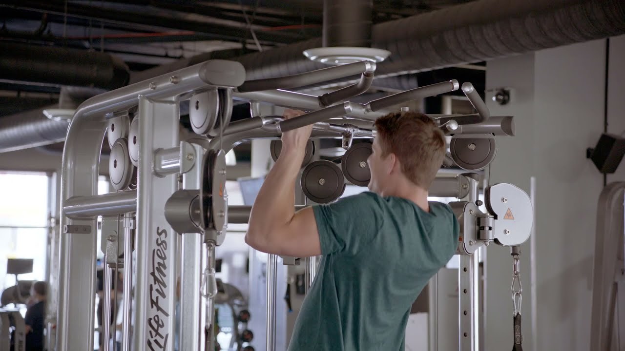 Pull-Up demonstrated by a NASM presenter (frame from NASM's official YouTube video)