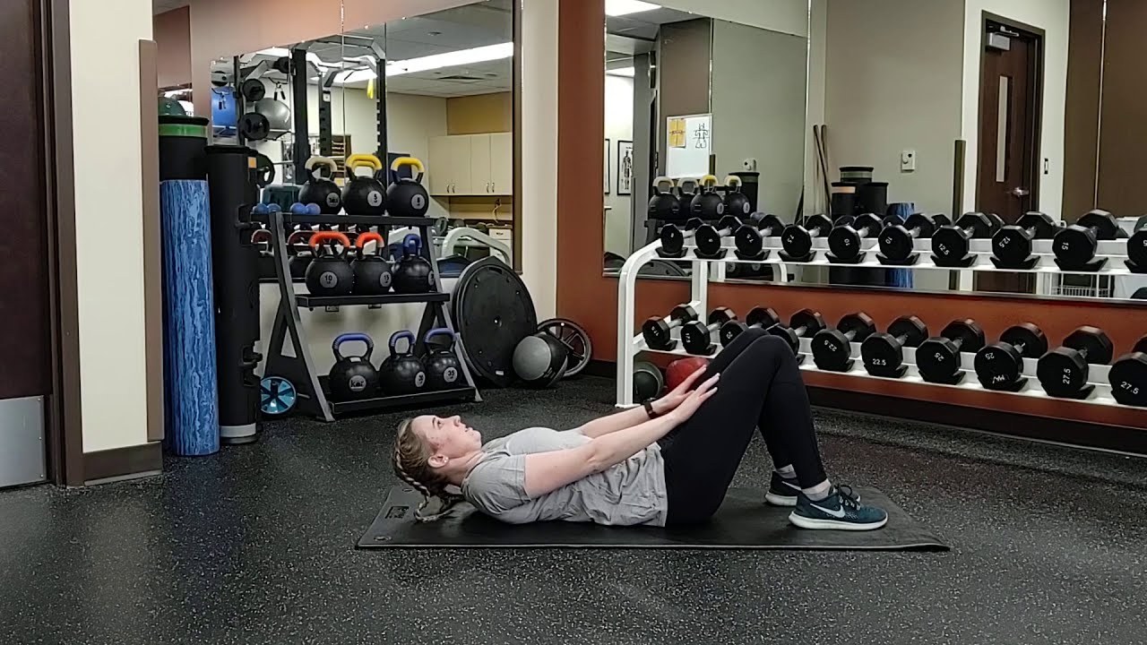 Abdominal Crunch demonstrated by University of Wyoming Campus Recreation staff (frame from official video)