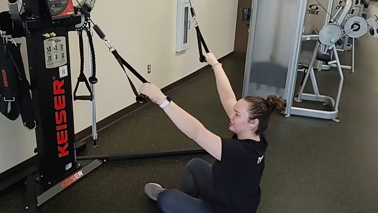 KFT-Seated Lat Pulldown demonstrated by University of Wyoming Campus Recreation staff (frame from official video)