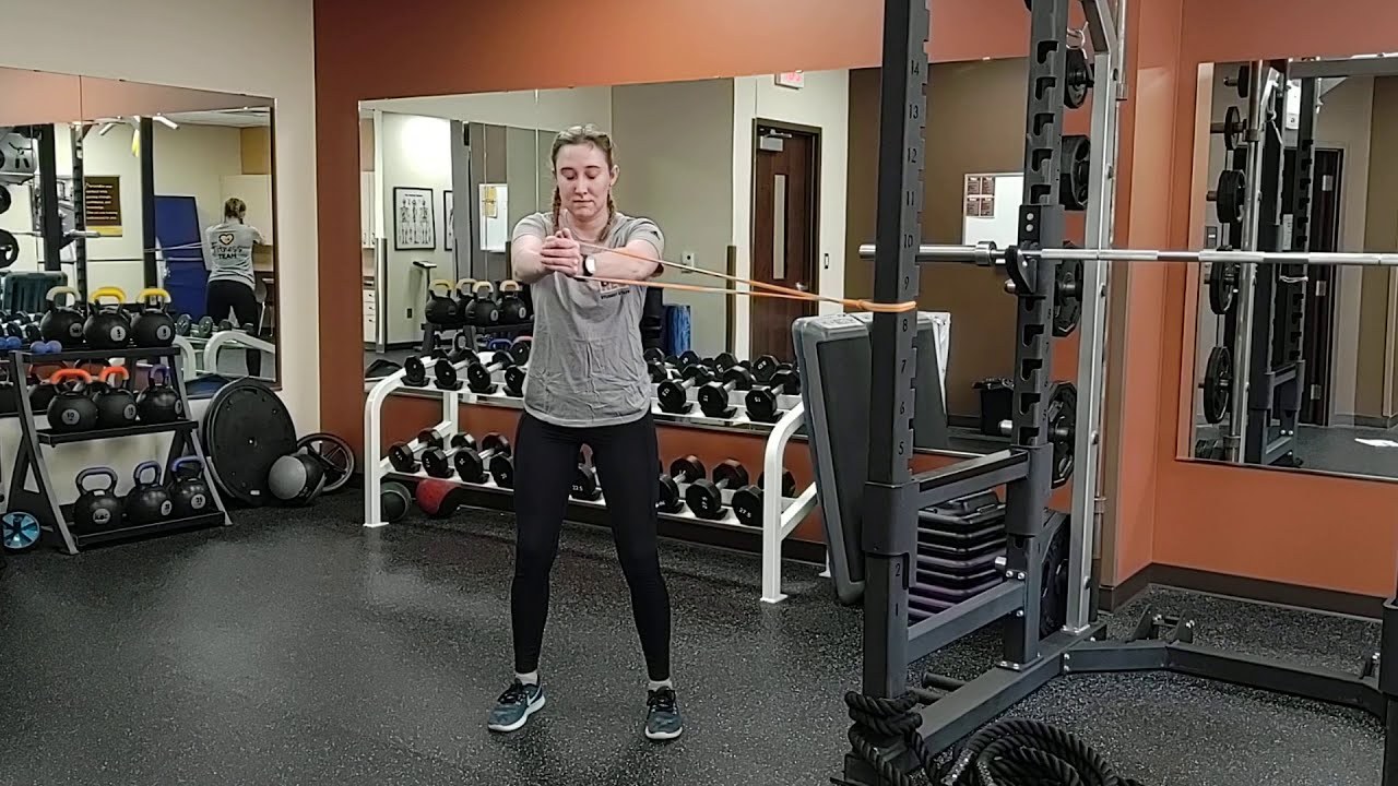 Pallof Press with Band (stationary) demonstrated by University of Wyoming Campus Recreation staff (frame from official video)