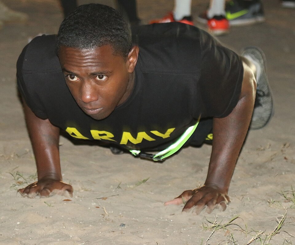 Soldier lowering into a full push-up on hands and toes (Wikimedia Commons photo)